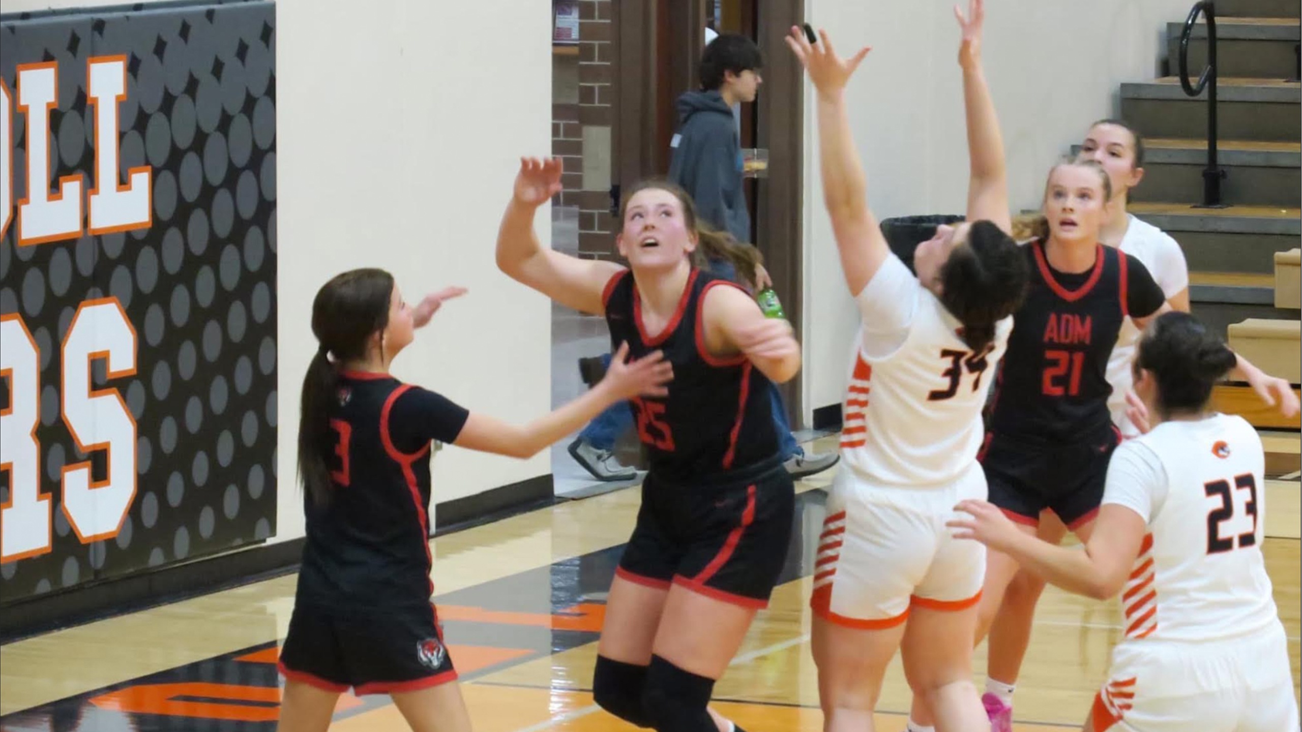 ADM Storms Back to Defeat Carroll